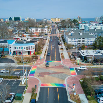 Crossroads in a city with rainbow artwork